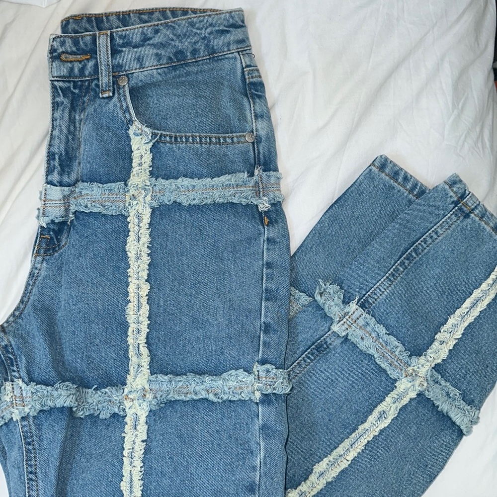 Ragged denim jeans